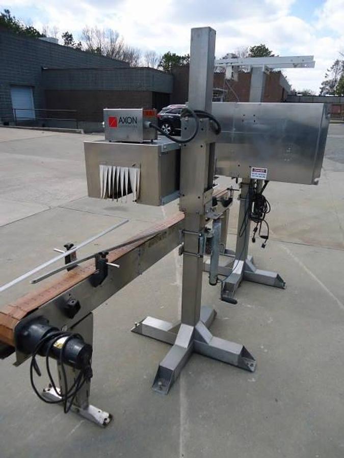 Used Axon Ez-130 Automatic Sleever/Neck Bander With Tunnel