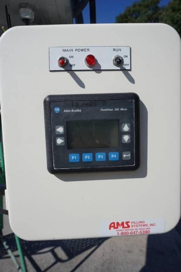 Used AMS A-100 Single Auger Pedestal Powder Filler, with Flexicon Feeder
