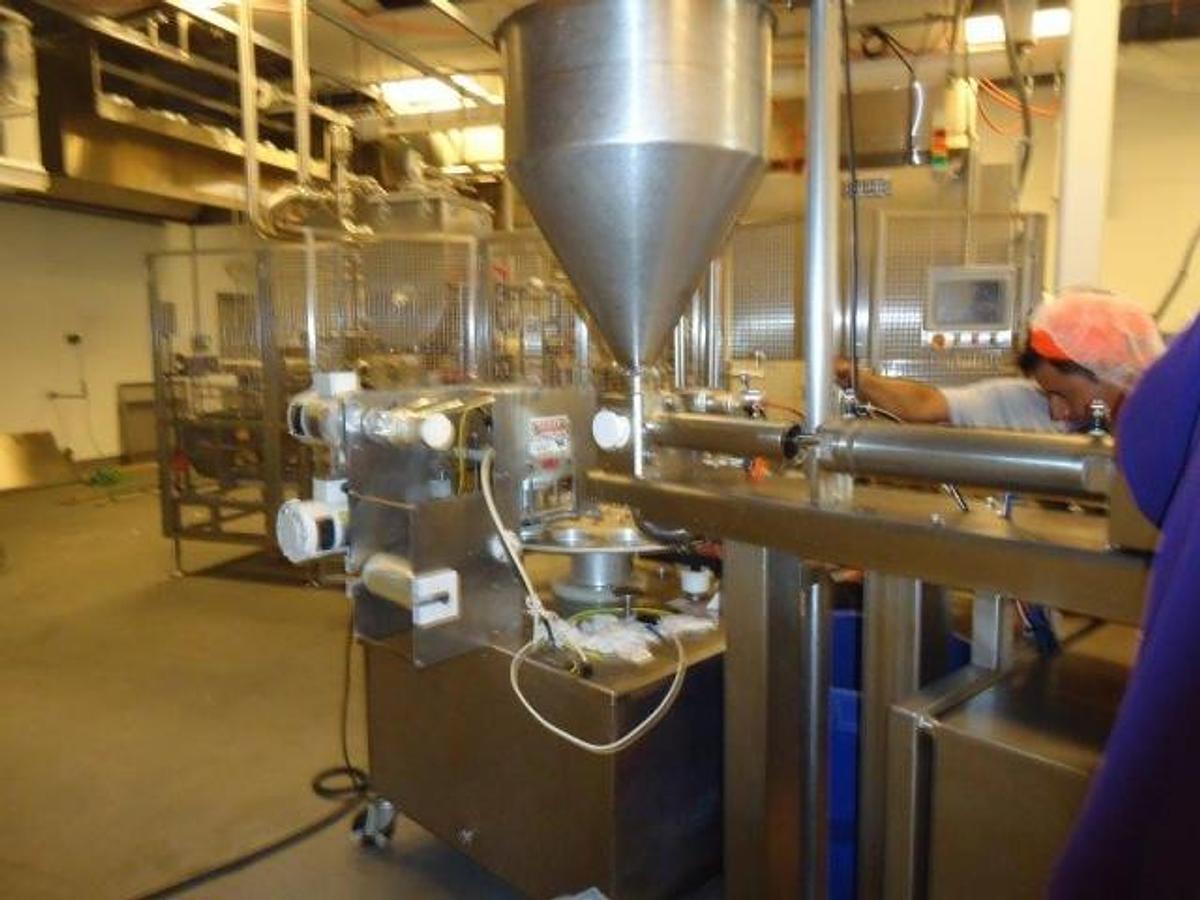 Used World Cup Rotary Cup Filling/Sealing Machine, 40 Per Minute