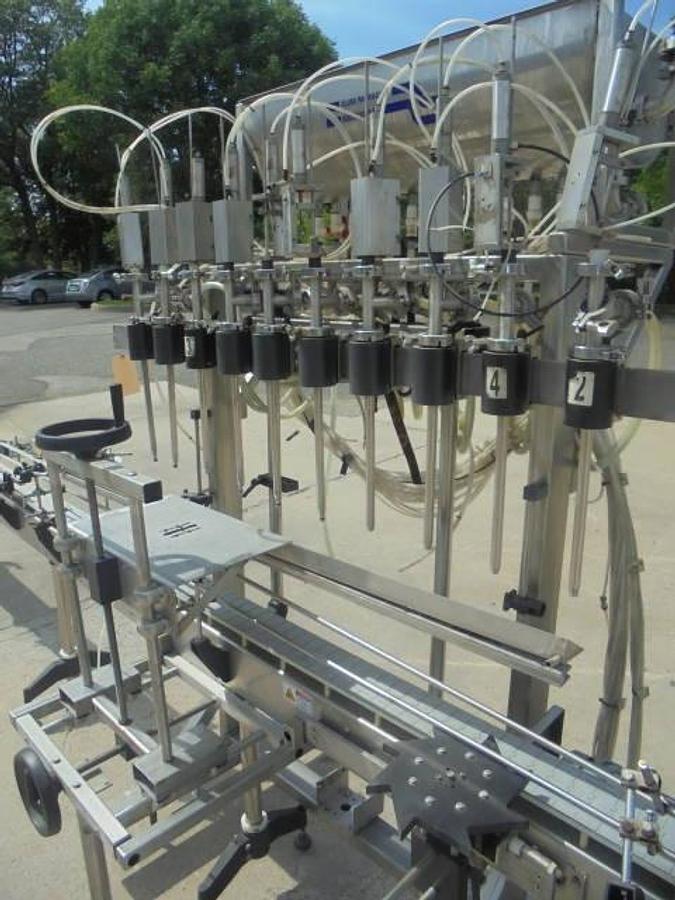 Used Fluid Packaging Solutions 10 Spout SS Gravity Liquid Filler, “Bottom Up” Fill
