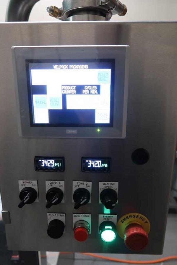 Used Wilpack W201 Double Lane Rotary Cup Filler/Sealer