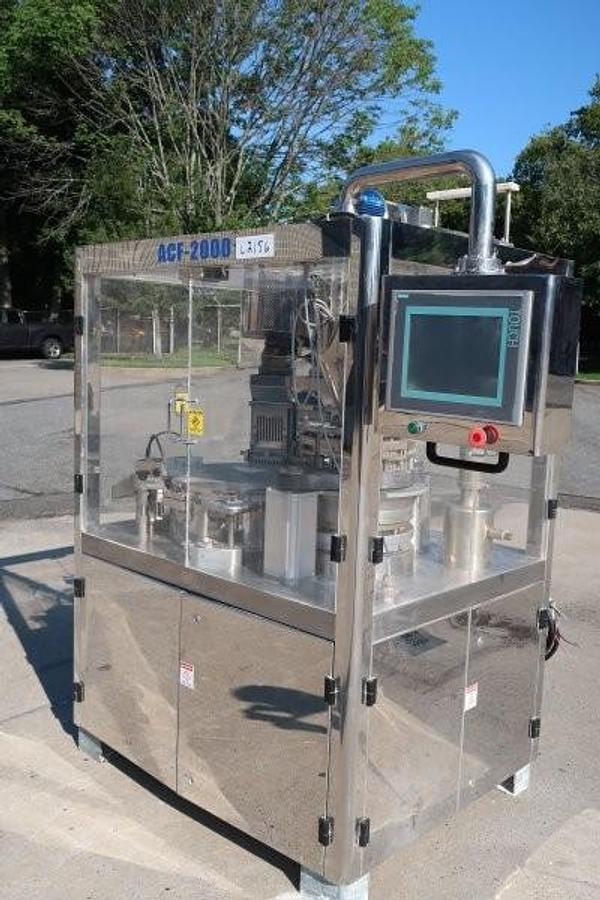 Used Tradamax Equipment and Supply Automatic capsule Filling Machine, 11 Station