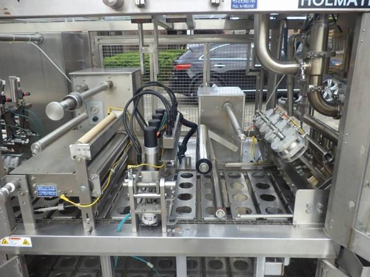 Used Holmatic OF-2340 “OPTI-FIL” Four Lane Cup Filler/Sealer/Overcap System