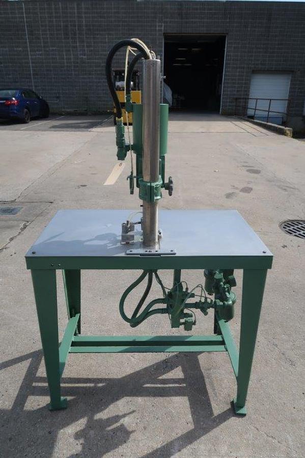 Used JG Bench Top Air Operated Crimper Mounted on Stand