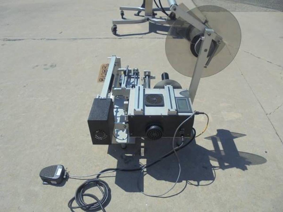 Used Universal R310 Tabletop Semi-Auto Pressure Sensitive Spot/Wraparound Labeler
