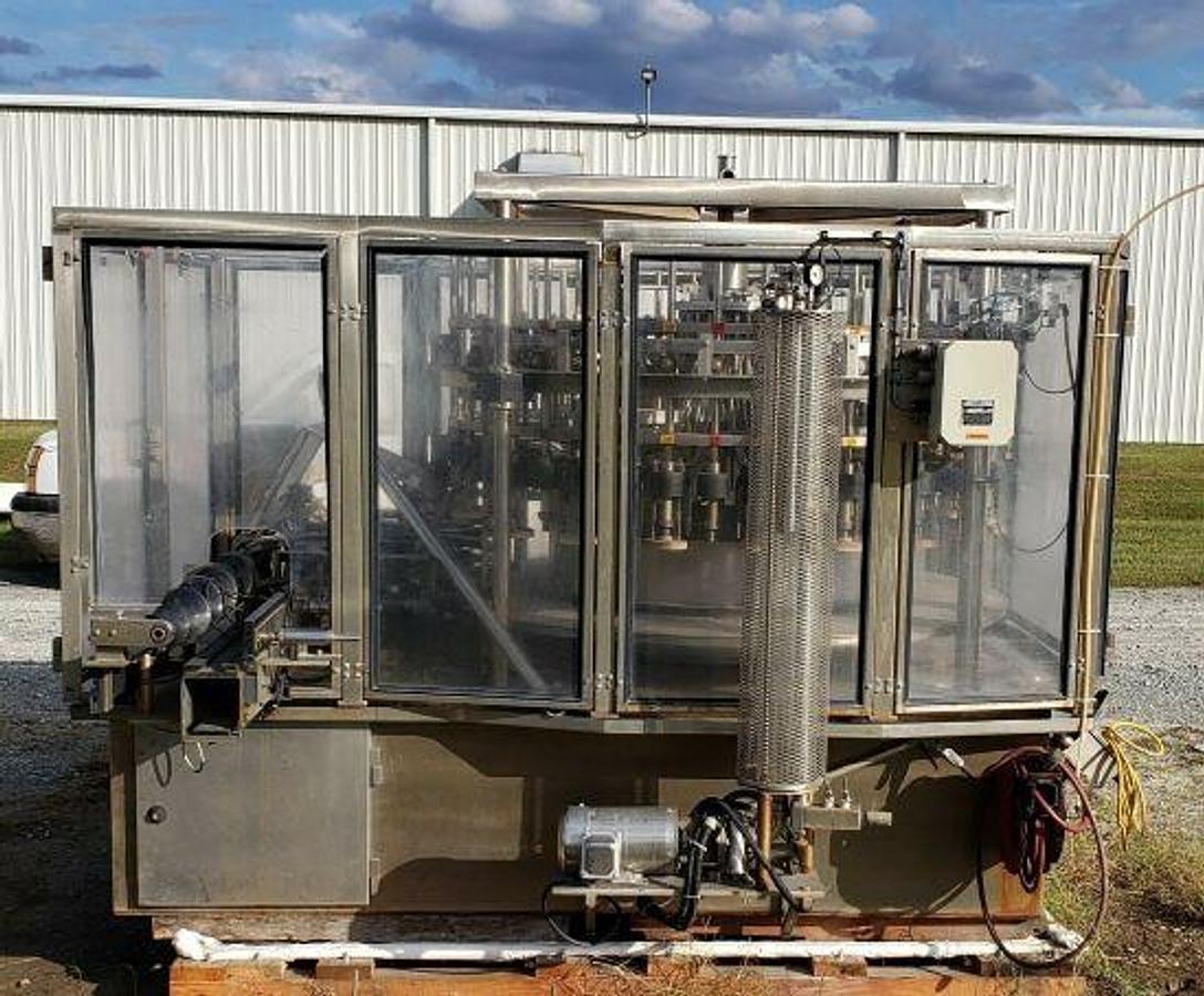 Used U.S. Bottlers 42 Valve Rotary Filling Machine