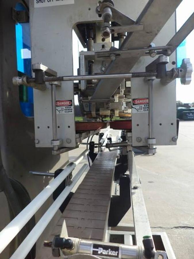 Used Pack West eight spindle inline automatic capper