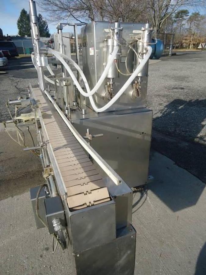 Used NATIONAL INSTRUMENT “FILAMATIC”” FOUR PISTON FILLER WITH CONVEYOR, 32 oz. pistons