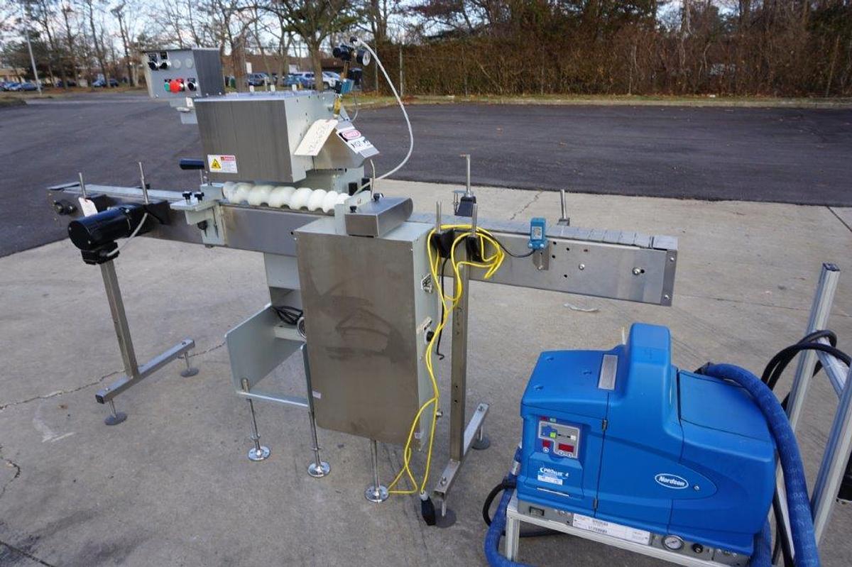 Used Creative Automation 401 Outserter, with Nordson Gluer