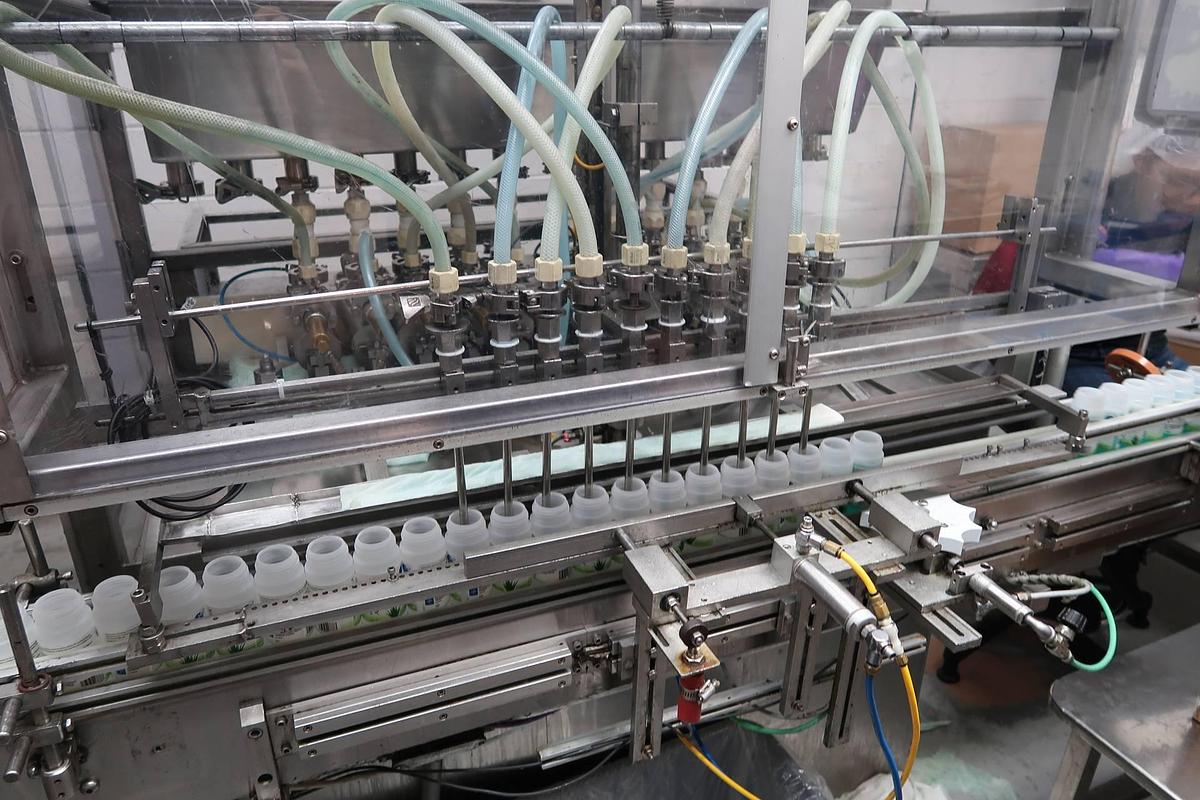 Used National Instrument Filamatic 14 Head Automatic Piston Filling Machine, 280 CC Pistons
