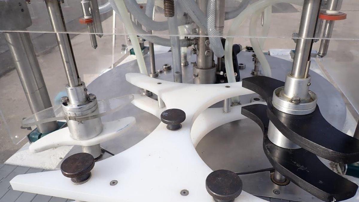 Used MRM 8 Spout Rotary Pressure Gravity Filler, XP