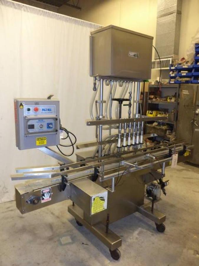 Used Kaps-All/Filz-All Automatic Gravity Overflow Liquid Filler