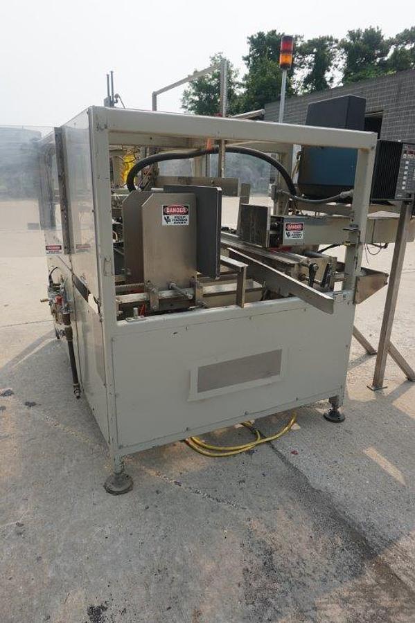 Used Packo-Matic Case Packaging Machine, Nordson Gluing