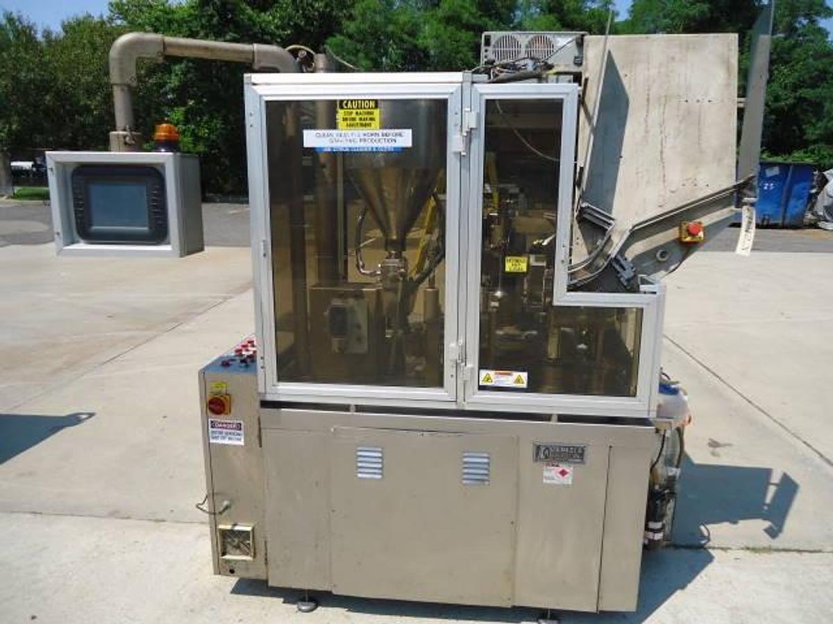 Used Comadis C100 automatic tube filler/sealer, high frequency sealing