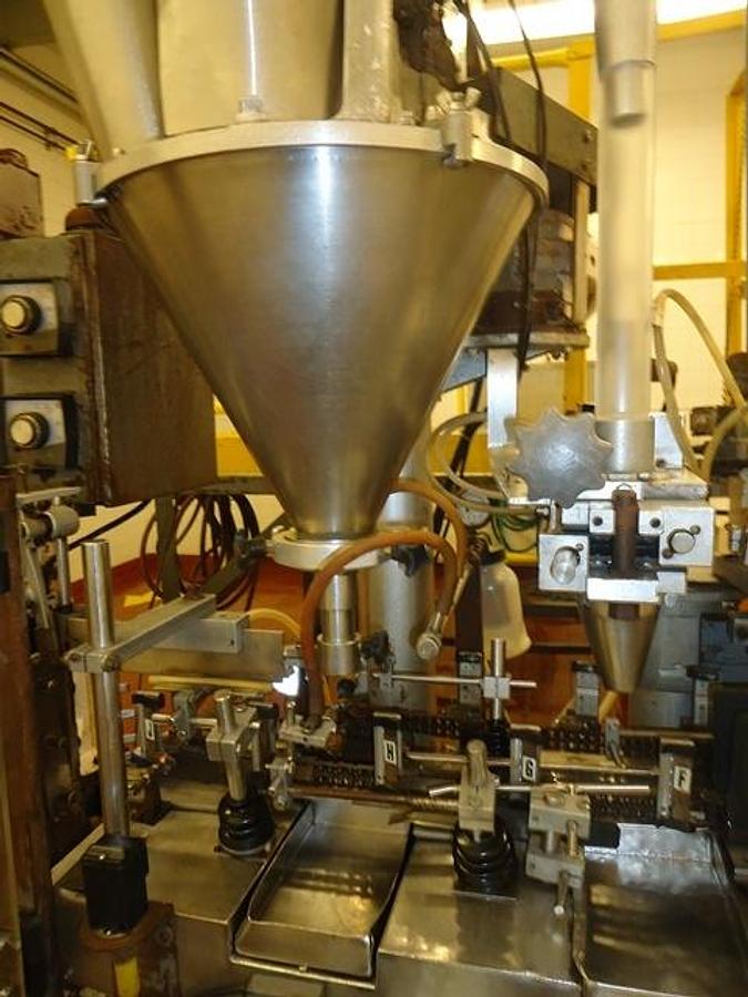 Used Bartelt IM-6 Horizontal Pouch Packager With Hot Melt Cartoner