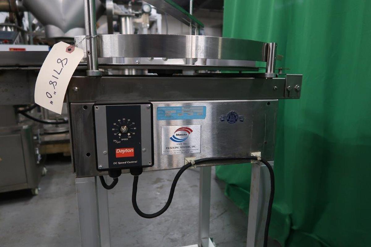 Used 24 In. Diameter Modular Packaging SS Rotary Unscrambling/Accumulating Table, With Unscrambling Shelf