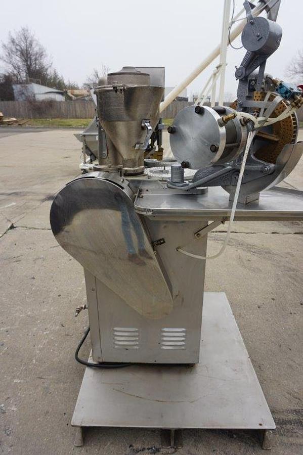 Used Elanco 8S Semi-Automatic Encapsulator, 15,000/Hr.