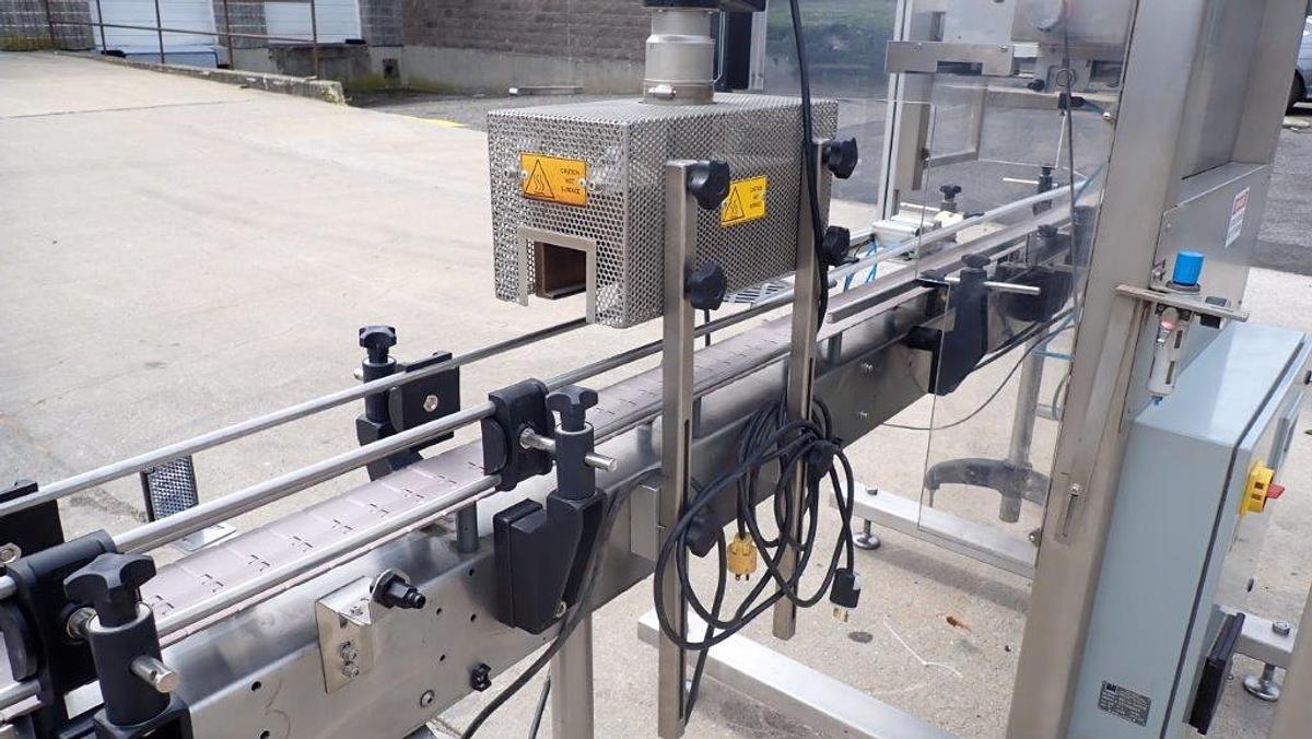 Used Aesus “Delta” High-Speed Neck Bander with Shrink Tunnel