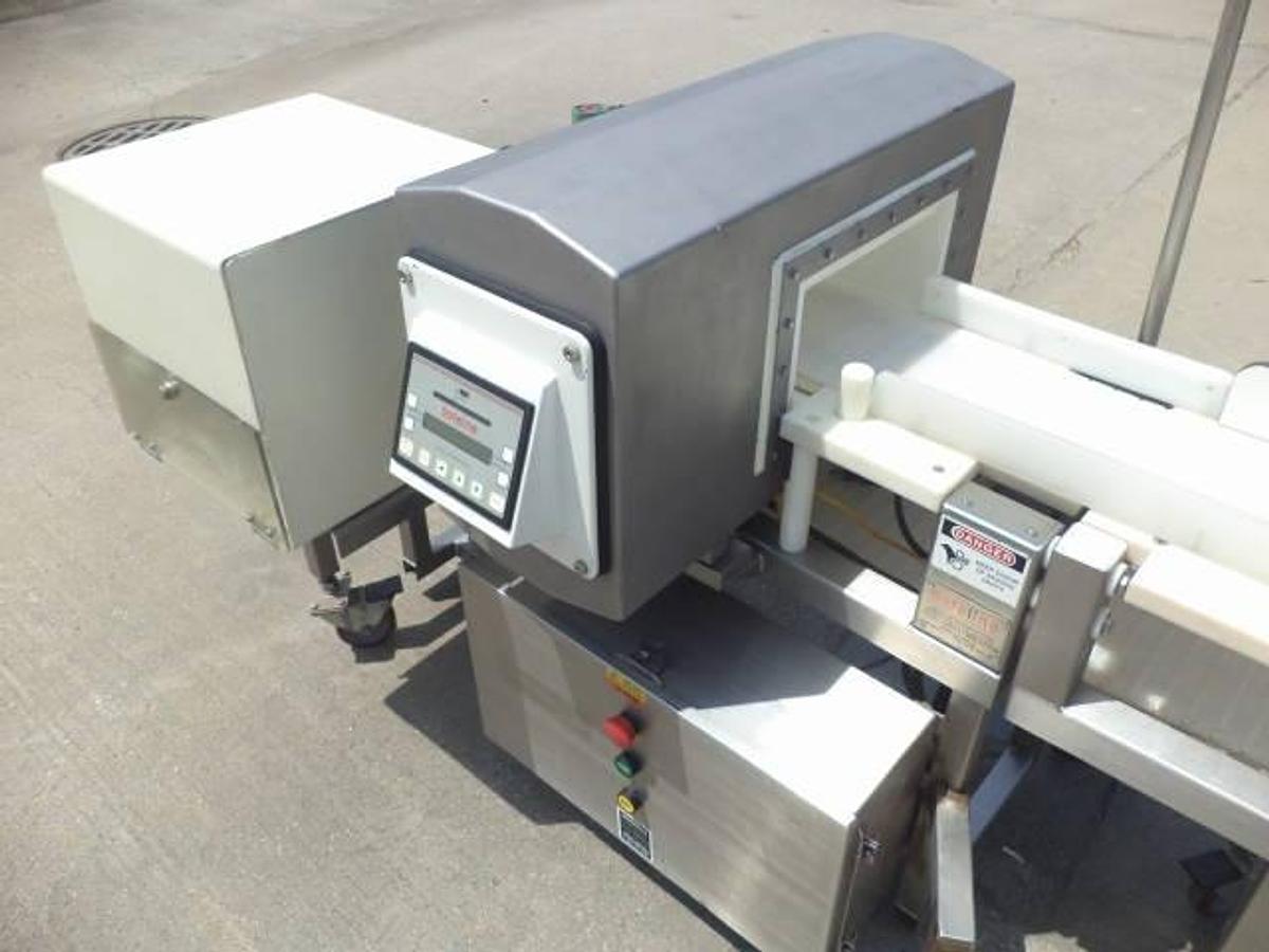 Used Safeline conveyorized metal detector, stainless steel