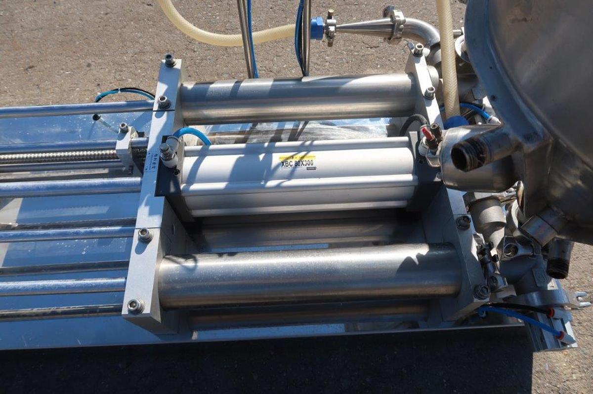 Used Dual Head Tabletop Piston Filler, 3 In. Wide X 15 In. Long Pistons