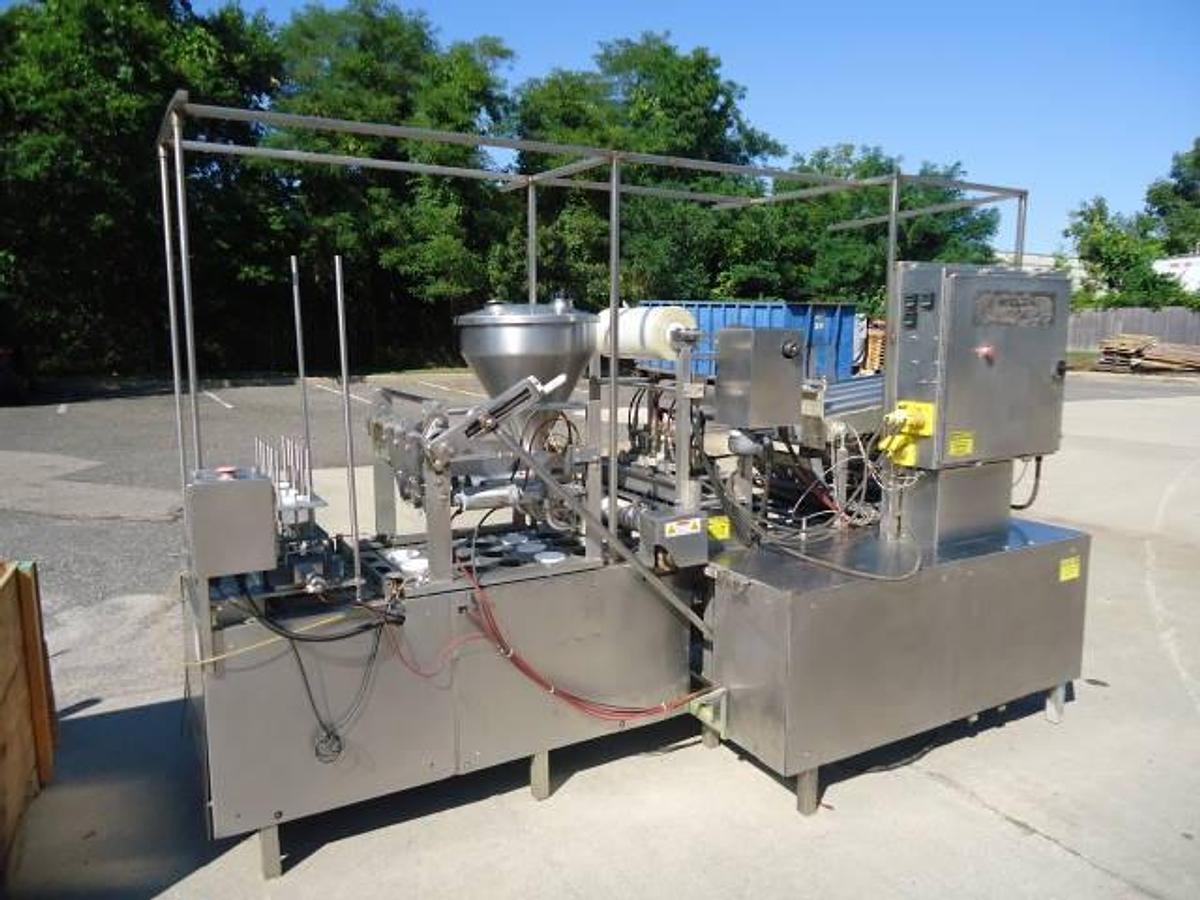 Used Modern Packaging Three Lane Cup Filler/Sealer/Lidder , Stainless Steel