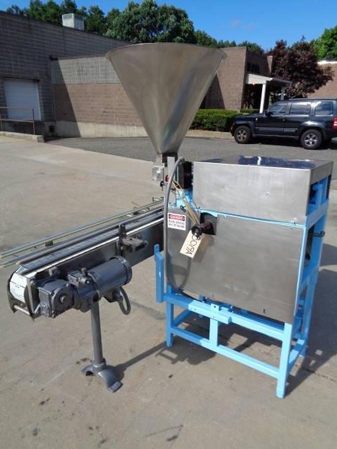 Used Simplex Twin Head Automatic Piston Filler With Indexing Conveyor