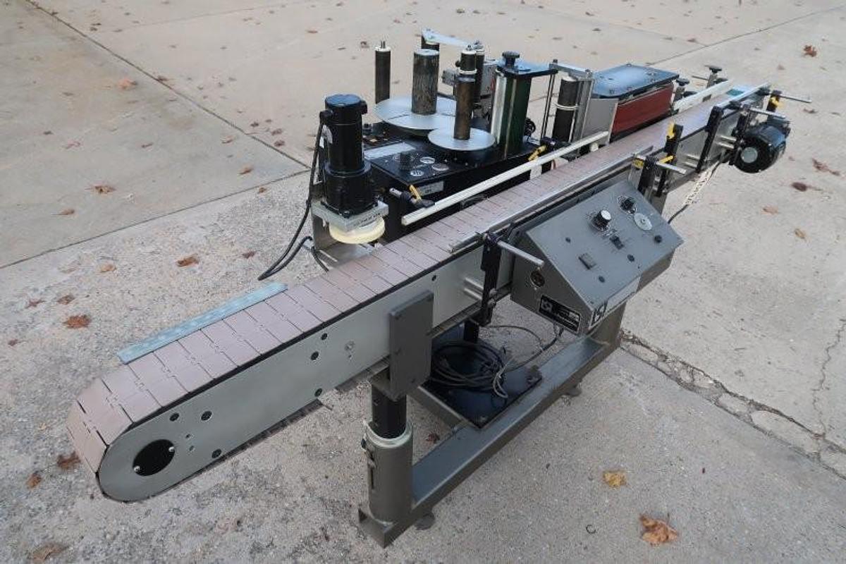 Used LSI Auto Pressure Sensitive Wraparound Labeler with Coder