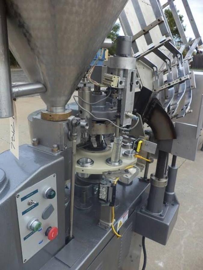 Used Comadis automatic plastic radiant heat tube filler