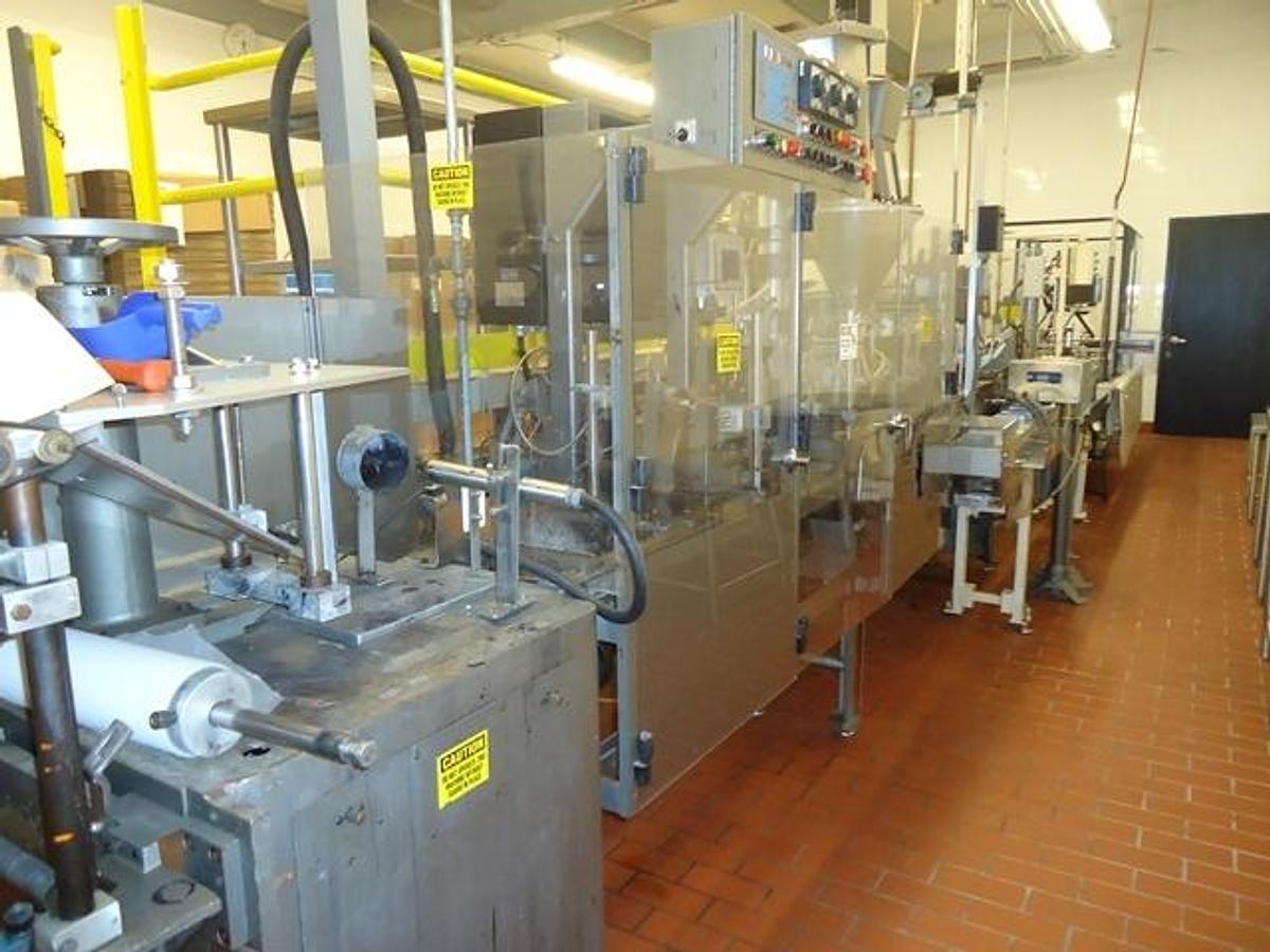 Used HMC/Bartelt IM 8-1/2-12 Pouch Packaging & Cartoning Line