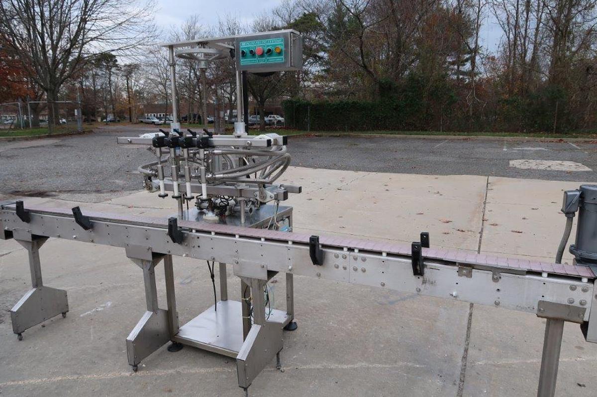 Used Inline Filling Systems 4 Spout Overflow Straight Line Liquid Filler, Stainless Steel