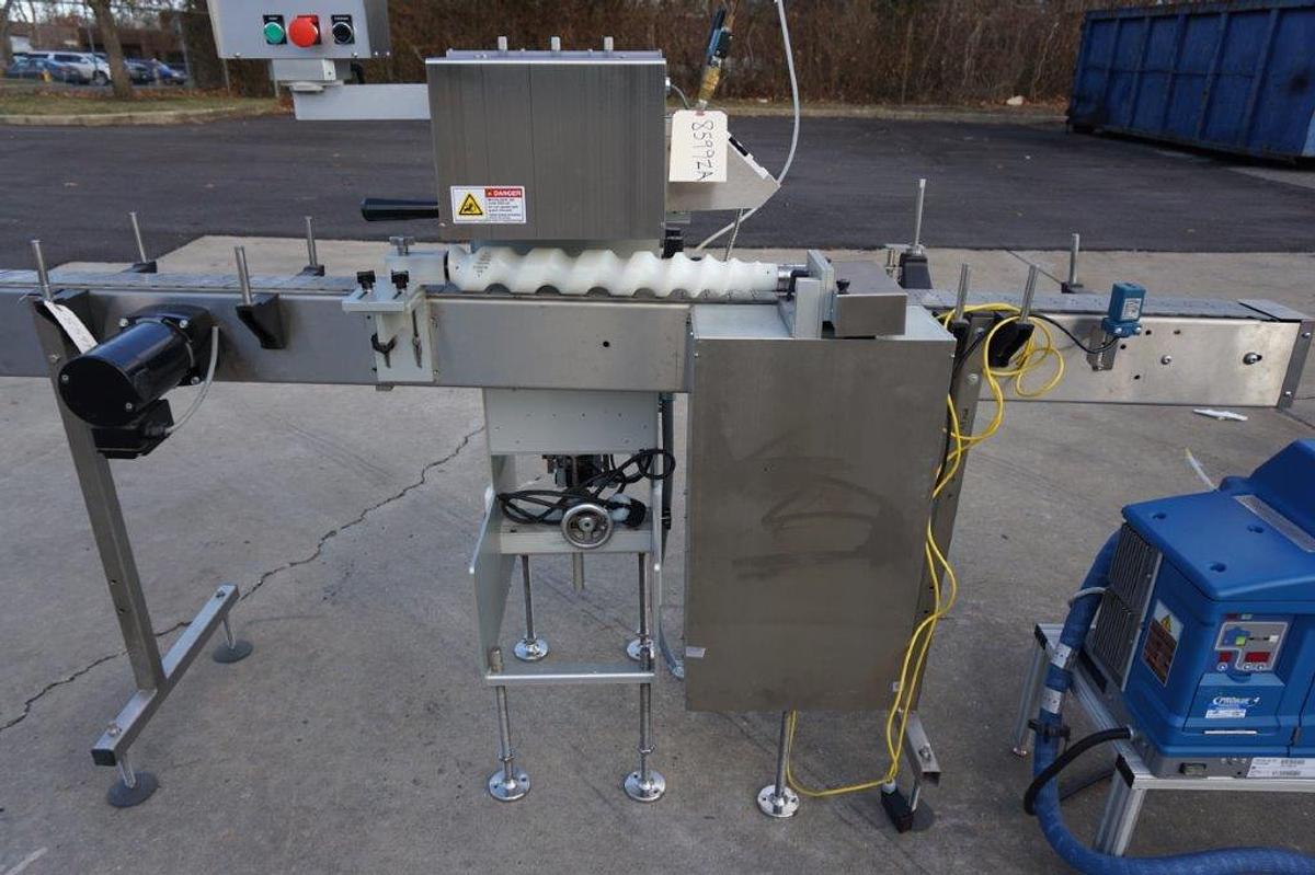 Used Creative Automation 401 Outserter, with Nordson Gluer