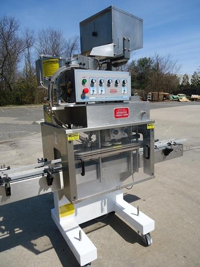 Used Kaps-All E4 Four Spindle Automatic Screw Capper, 80 Per Minute