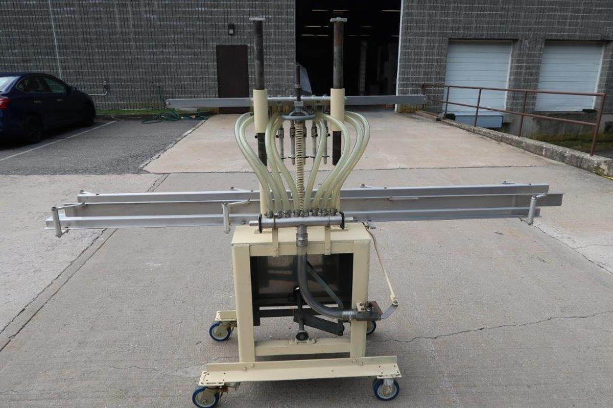 Used 8 Spout Semi-Automatic Liquid Filler, Portable