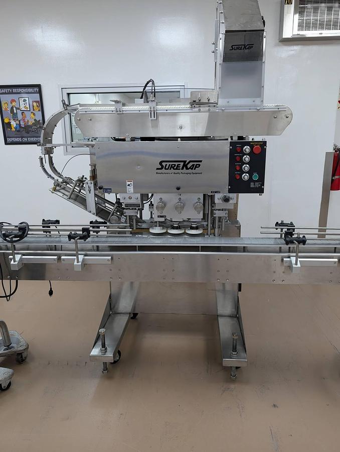 Used Surekap SK6000 Six Spindle Capper, Pharma Use