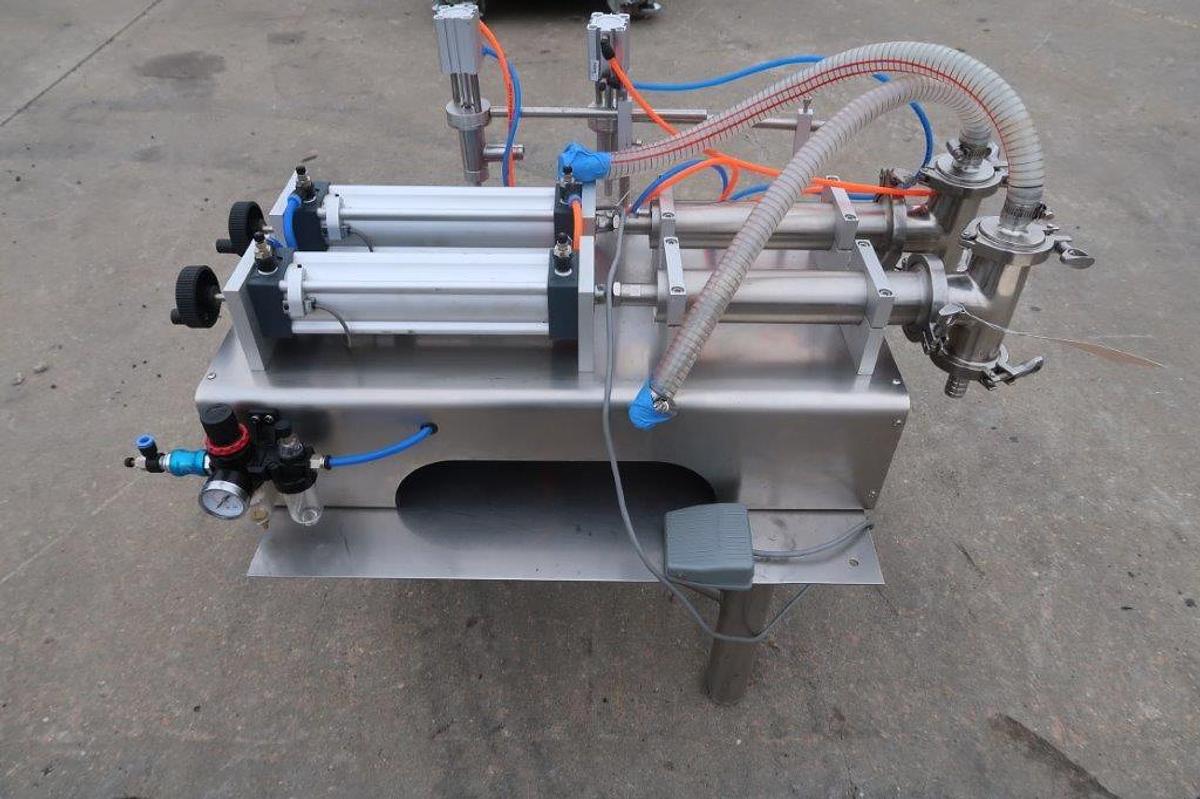 Used Quantitative Tabletop Dual Head Piston Filler, Air Operated