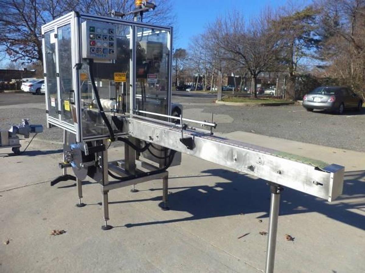 Used PDC 65-M Tamper Evident Neck Bander/Sleever, 200 pm