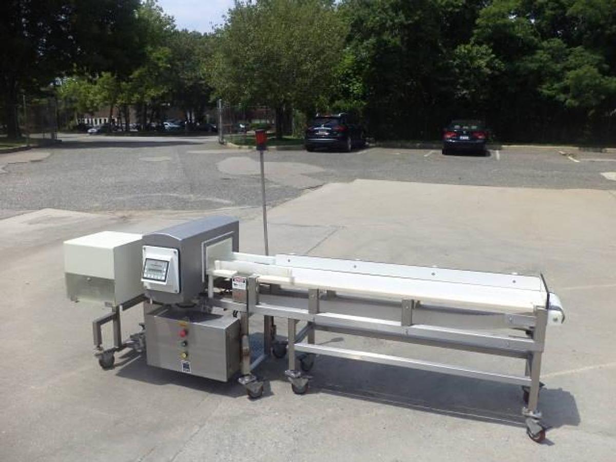 Used Safeline conveyorized metal detector, stainless steel