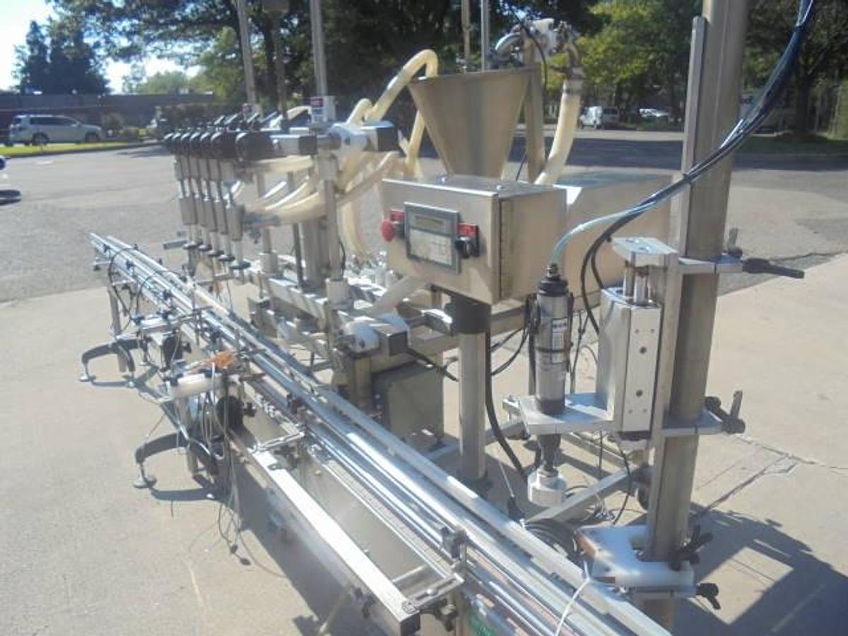 Used Inline Filling Systems “Servo” Six Nozzle Positive Displacement Pump Style Filler