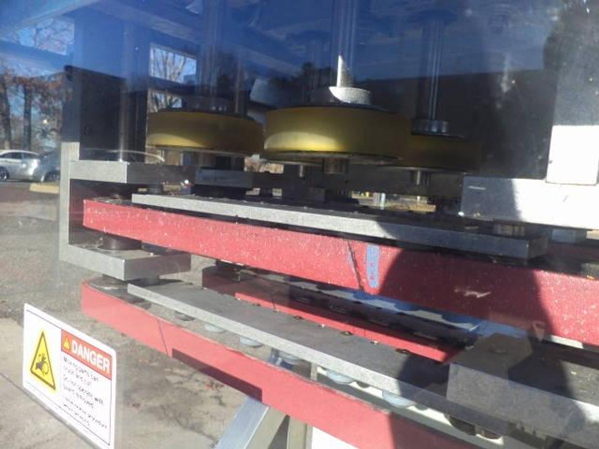 Used New England Four Spindle Cap Tightener, Single Phase