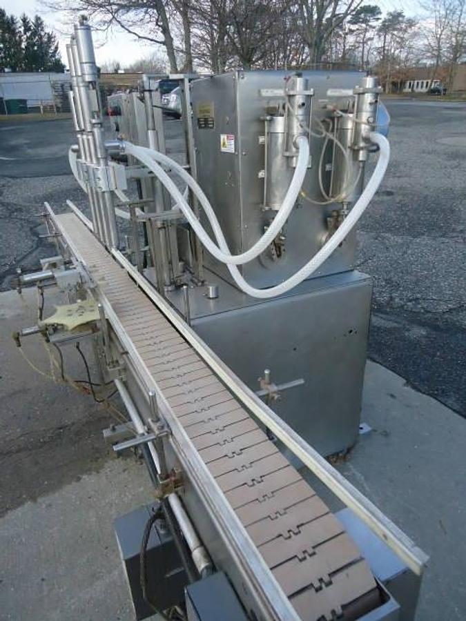 Used NATIONAL INSTRUMENT “FILAMATIC”” FOUR PISTON FILLER WITH CONVEYOR, 32 oz. pistons