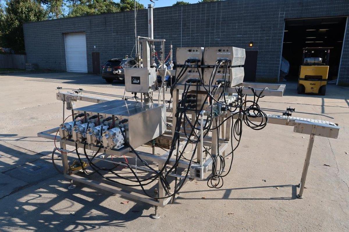 Used Oden Four Head Pump Style Positive Displacement Filler