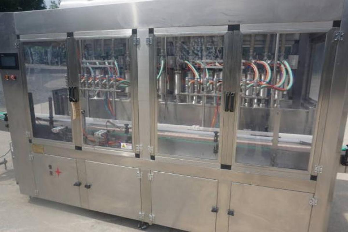 Used 16 Piston Inline Filling Machine, 40 Oz.