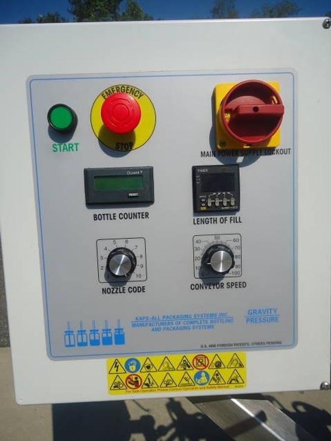 Used Kaps-All Twelve Spout Inline Pressure Filler Model Fa-P