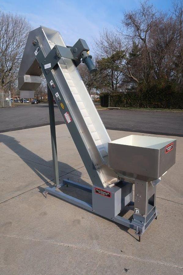 Used Hytrol 12 In. Wide Inclined Cleat Belt Conveyor/Feed, 80 In. Discharge Height