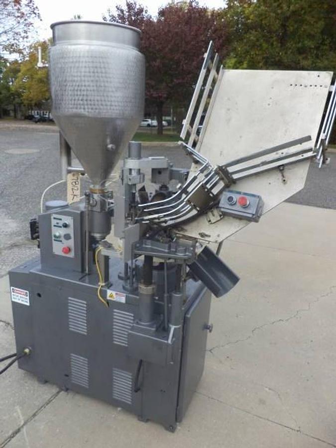 Used Comadis automatic plastic radiant heat tube filler