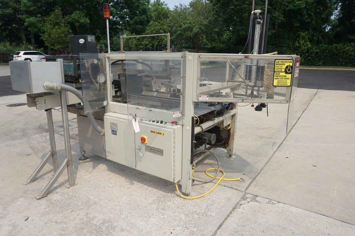 Used Packo-Matic Case Packaging Machine, Nordson Gluing