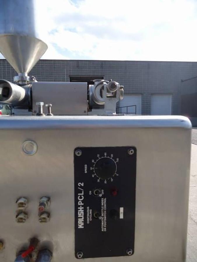Used Kalish  Pcl/2 Twin Head Piston Filler