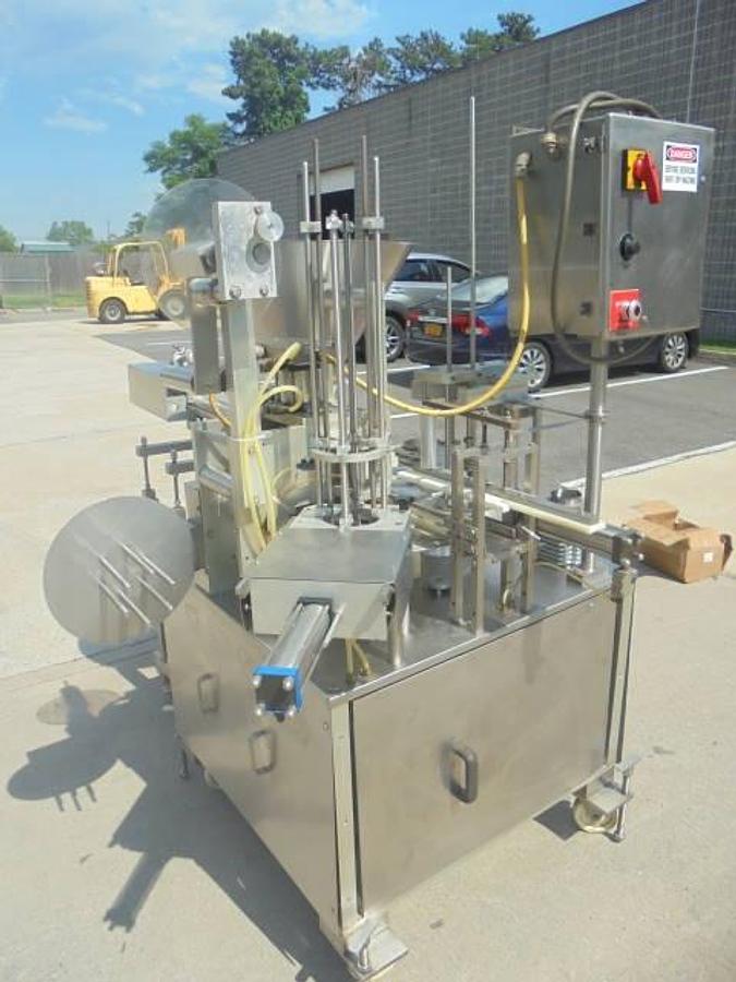 Used Autoprod RO-A3 Rotary Cup Filler/Sealer/Capper, 50 Per Minute