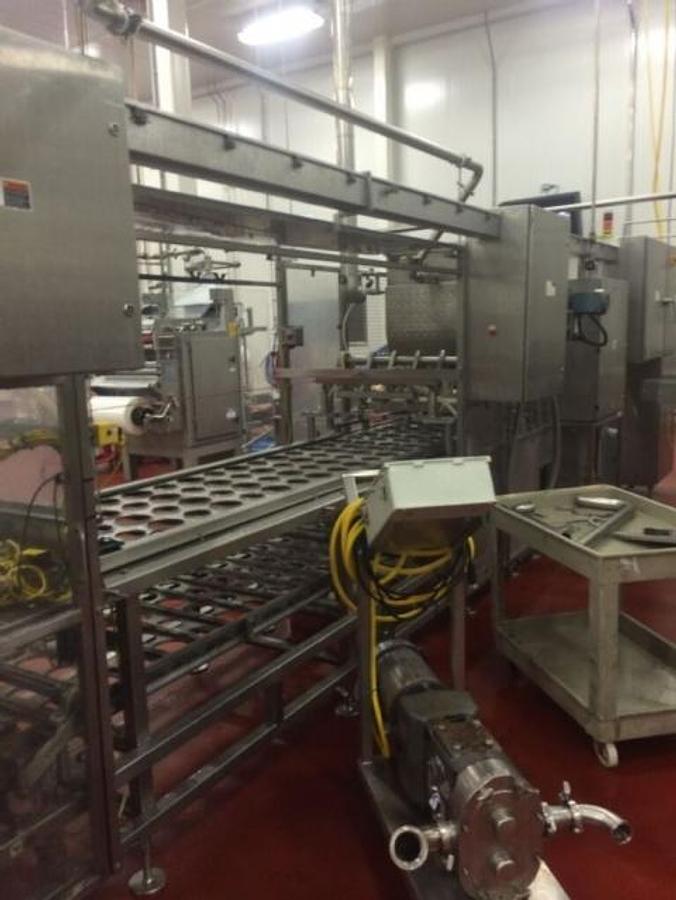 Used Osgood Four Lane Cup Filling System, 3.5 In. & 4.5 In. Diameter Tooling