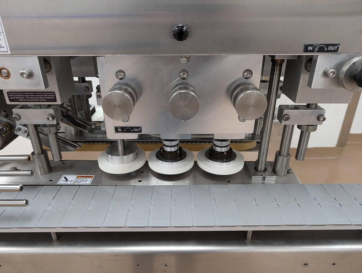 Used Surekap SK6000 Six Spindle Capper, Pharma Use